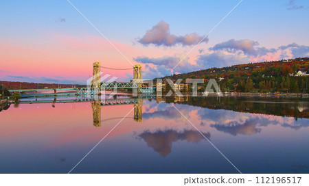 Aerial Autumn Sunset at Portage Lake Lift Bridge with Reflection 112196517