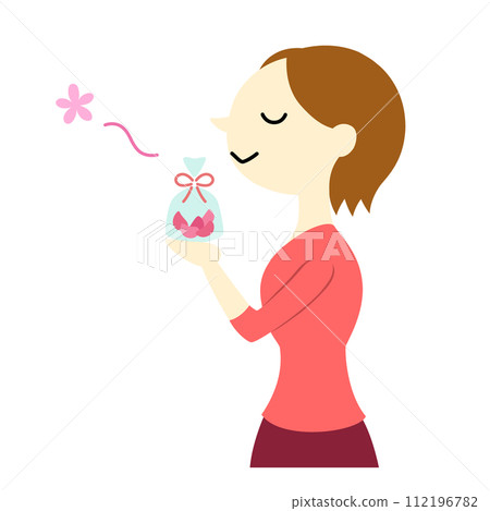 A woman with short hair enjoying the scent of a scent bag, no main line A woman with short hair enjoying the scent of a scent bag, no main line 112196782