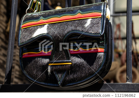 Colombian traditional leather satchel from the Antioquia Region called Carriel at the famous Comuna 13 in Medellin 112196862