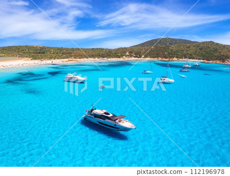 Aerial view of luxury yachts on blue sea at sunny day 112196978