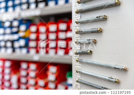 An assortment of anchors with sizes and prices 112197195