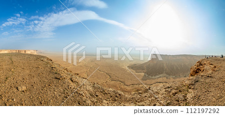 The Jabal Tuwaiq Mountains, with arid desert below, landscape panorama, Riyadh, Saudi Arabia The Jabal Tuwaiq Mountains, with arid desert below, landscape panorama, Riyadh, Saudi Arabia 112197292