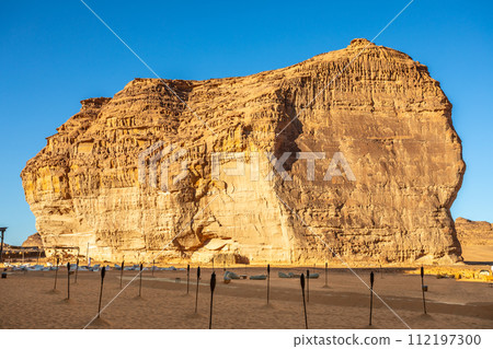 Sandstone rock erosion monolith standing in the desert, Al Ula, Saudi Arabia Sandstone rock erosion monolith standing in the desert, Al Ula, Saudi Arabia 112197300