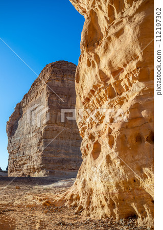 Sandstone elephant rock erosion monolith standing in the desert, Al Ula, Saudi Arabia 112197302
