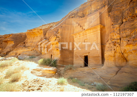 Ancient  Nabataean tombs of Jabal al Ahmar carved in stone rock, Madain Saleh, Al Ula, Saudi Arabia 112197307