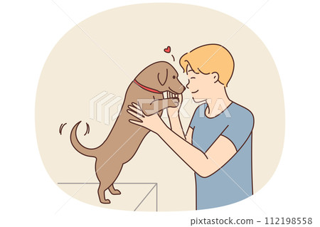 Happy man playing with dog Happy man playing with dog 112198558
