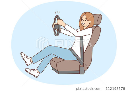 Smiling woman with steering wheel learn driving 112198576