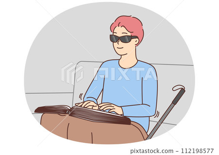 Blind man read braille book 112198577