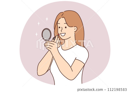 Smiling woman apply lipstick Smiling woman apply lipstick 112198583