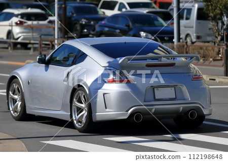 Image of a sports car running in the city 112198648