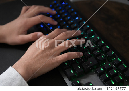 Hands typing on the keyboard: Image of programming, games, and computers 112198777