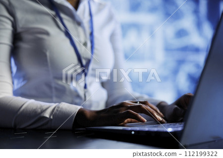Computer scientist developing artificial intelligence neural networks nodes modeled after human brain. Diligent employee setting up AI machine learning accurately making predictions using data 112199322