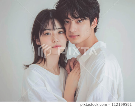 Portrait of a smiling young couple 112199591