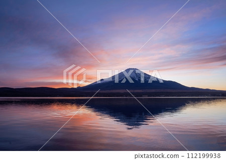 Spectacular view of Mt. Fuji with a fantastic sunset background seen at Lake Yamanaka 112199938
