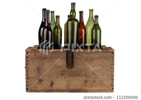 Antique retro green glass bottles on wooden box Antique retro green glass bottles on wooden box 112200090