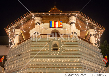 Night view of the octagonal pavilion named Paththirippuwa in Temple of the Sacred Tooth Relic a Buddhist temple in the city of Kandy, Sri Lanka. 112200427