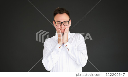 Flattered expression pleasant surprise happy guy 112200647