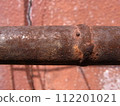 Rusty iron rod left outdoors 112201021