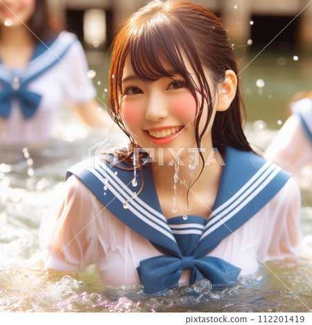 High school girl playing in the water 112201419