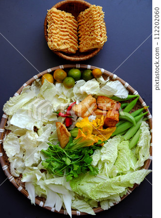 raw material for vegan Vietnamese meal, simple homemade food, instant noodles with green vegetables 112202060