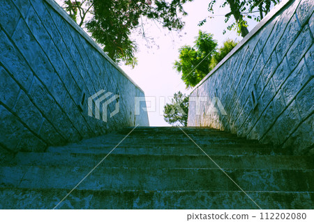 ancient staircase with stone step among two rock wall ancient staircase with stone step among two rock wall 112202080