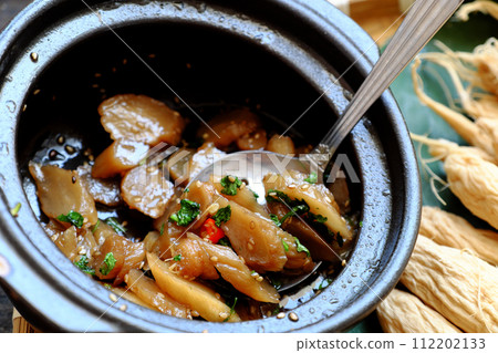 vegan food for daily meal, salted white radish cook with sauce and sesame 112202133