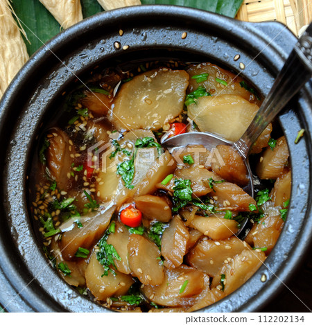 vegan food for daily meal, salted white radish cook with sauce and sesame 112202134