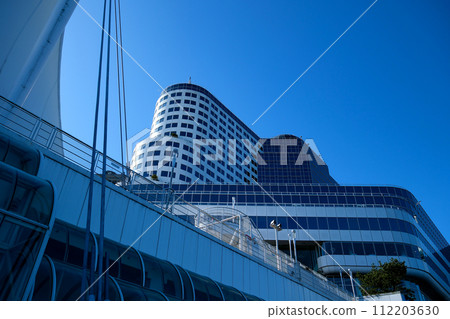 view of canada Place on the embankment different sides of a beautiful city skyscrapers big ships flag planes mountains a city everything expensive luxury vacation trip travel glass building offices view of canada Place on the embankment different sides of a beautiful city skyscrapers big ships flag planes mountains a city everything expensive luxury vacation trip travel glass building offices 112203630