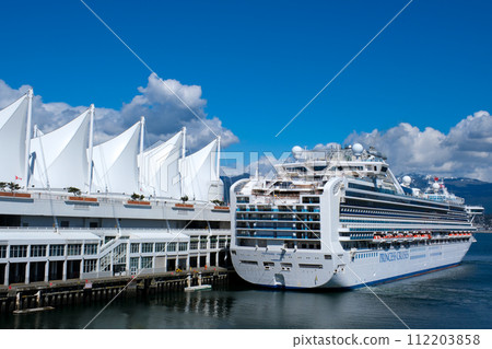 Canada Place beautiful screensaver of any background For text of advertising Vancouver travel cruise liners sea bass sea bus huge ship Helicopter runway white snowy fluffy clouds Canada Place beautiful screensaver of any background For text of advertising Vancouver travel cruise liners sea bass sea bus huge ship Helicopter runway white snowy fluffy clouds 112203858