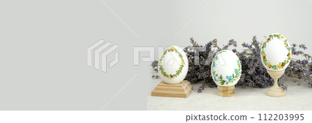 banner with lavender flowers and three eggs for easter embroidery threads on eggshell ornament handmade darling beautifully stylish place for text this is postcard envelope product packaging banner with lavender flowers and three eggs for easter embroidery threads on eggshell ornament handmade darling beautifully stylish place for text this is postcard envelope product packaging 112203995