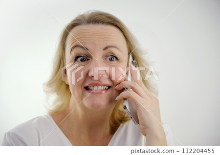 cute woman surprised by bad news talking on phone raised bad news understand that someone is taking advantage of each other not know what to say embarrassment help lawyer social assistance 112204455