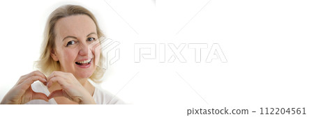 Attractive middle aged woman feeling happy and romantic heart shapes expressing tender feelings Concept of love and care for people banner for advertising white background product on billboard 112204561