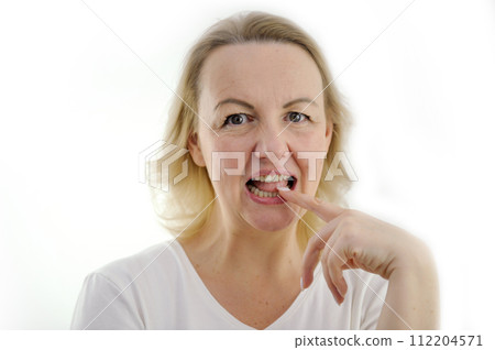 think over proposal woman bit index finger with teeth opened eyes and looks into frame on white background an interesting offer that is difficult to refuse entertaining story communication think focus think over proposal woman bit index finger with teeth opened eyes and looks into frame on white background an interesting offer that is difficult to refuse entertaining story communication think focus 112204571