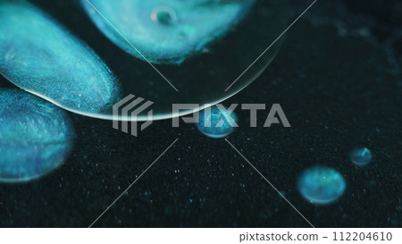 Oil droplets gel liquid blob blue paint water dark 112204610