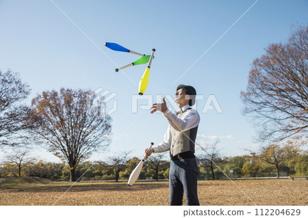 image of a man juggling 112204629