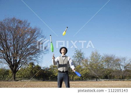 image of a man juggling image of a man juggling 112205143