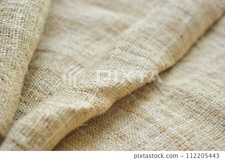 brown sackcloth texture background, crumpled burlap fabric textile for design brown sackcloth texture background, crumpled burlap fabric textile for design 112205443