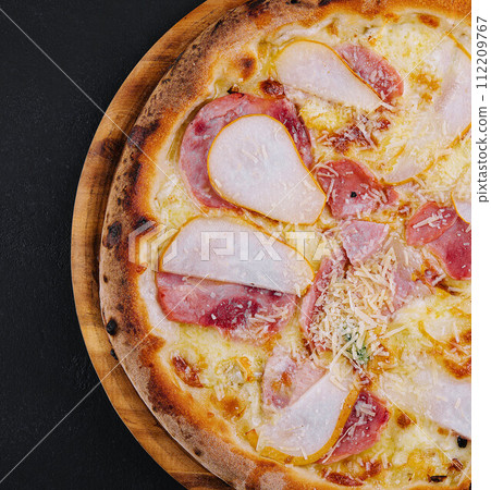 Delicious meat pizza with salami, ham and cheese 112209767