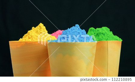 Color Powder Cups On Black For Holi Festival Color Powder Cups On Black For Holi Festival 112210895