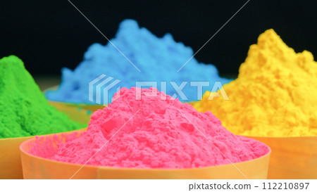 Colored Powder On Black For Holi Festival 112210897