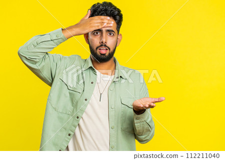 Indian young man making face palm gesture, feeling bored, disappointed in result, bad news, quarrel 112211040
