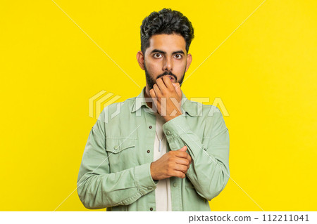 Scared fearful depressed Indian man suffering phobia, anxiety disorder, expresses fear, stress panic 112211041