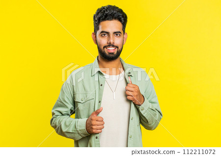 Happy lovely smiling young man looking at camera dreaming, resting, good news, feel satisfied 112211072