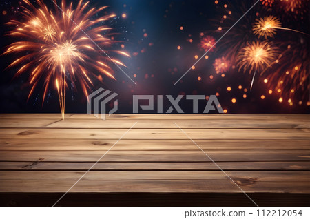 Empty wooden table with fireworks background 112212054