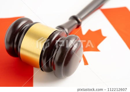 Canada flag with judge hammer, Law and justice court concept. 112212607