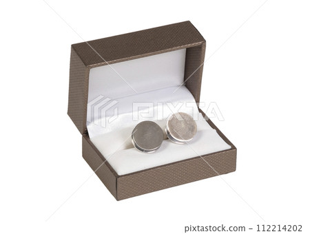 Old silver cufflinks in a box, on white background 112214202