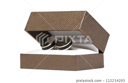 Old silver cufflinks in a box, on white background 112214203