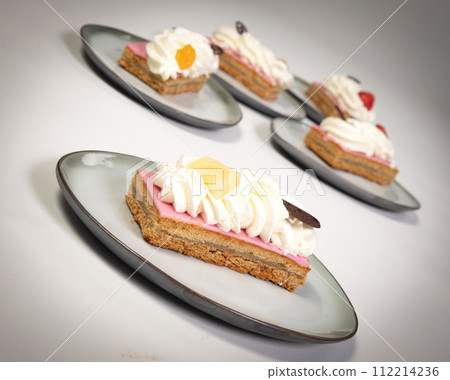Pieces of traditional dutch oranjekoek, local delicacy from Friesland Pieces of traditional dutch oranjekoek, local delicacy from Friesland 112214236