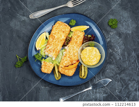 Fried Fish fillets with breadcrumbs 112214613