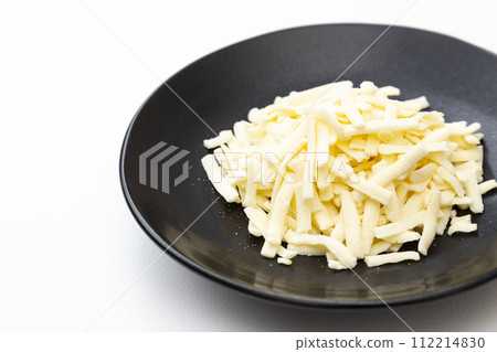 Melting cheese on a white background 112214830